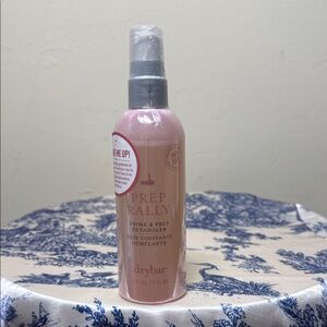 Drybar Prep Rally Prime & Prep Detangler in Light Pink.
